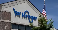 Kroger said it plans to lower grocery prices by $1 billion if federal regulators approve the proposed $25 billion merger with Albertsons