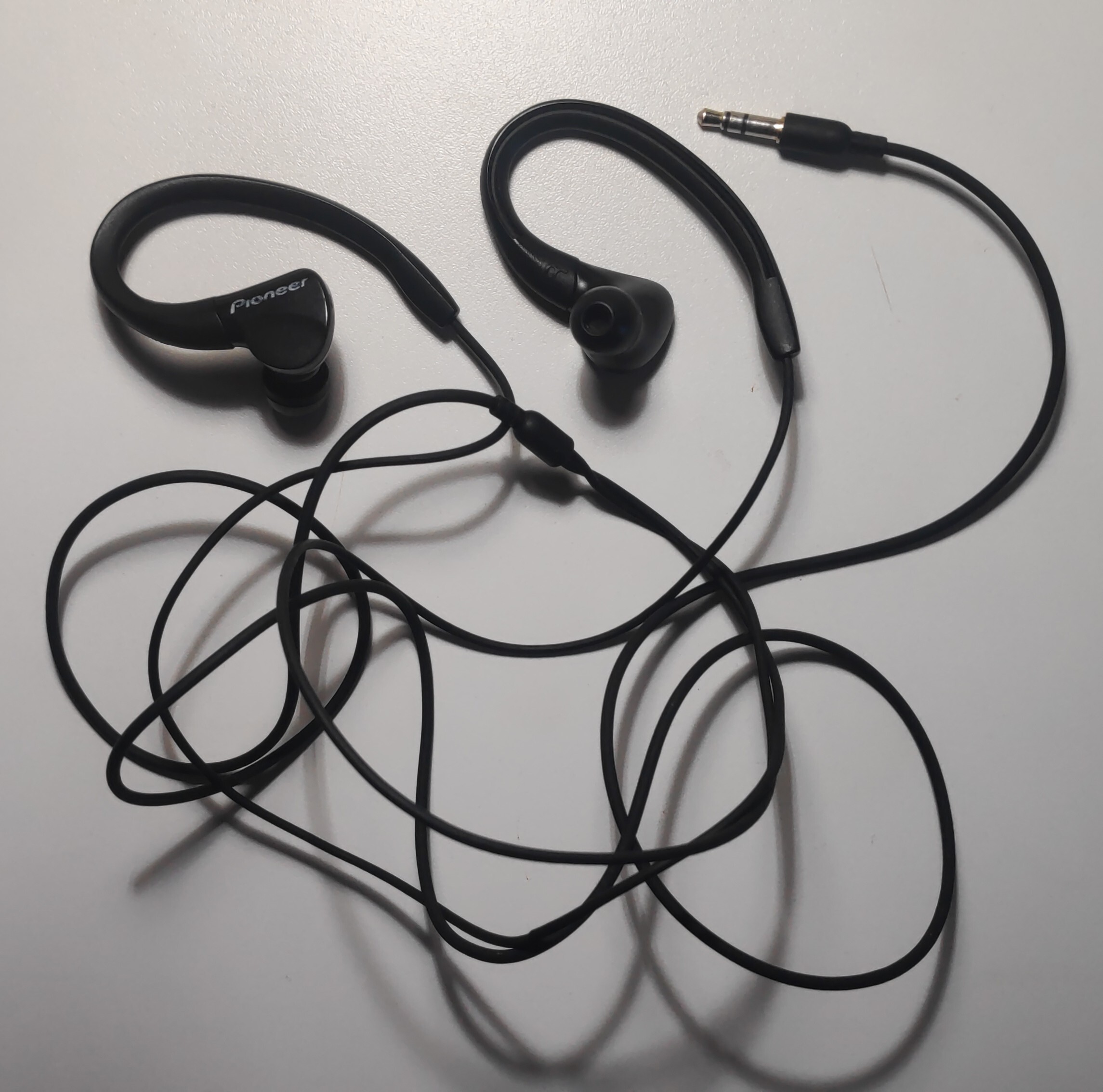 black wired earbuds with hooks
