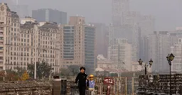 China's smog-covered north on highest pollution alert as visibility drops