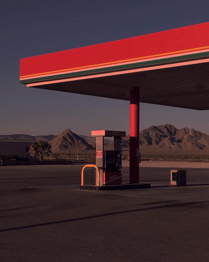 Empty gas station during a sunset