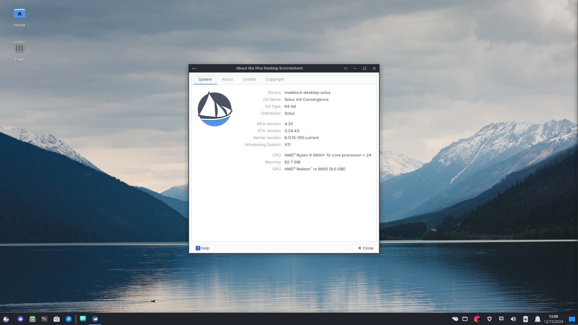 The default Solus XFCE4 experience, with a panel on the bottom, launchers and tasklist on the left, and clock and status tray on the right. In the center of the screen is a program window open to the About page for the system. The background depicts a lake with dark, whitecapped mountains in the background and a cloudy sky. The OS is Solus 4.6 Convergence, and the XFCE version is 4.20.