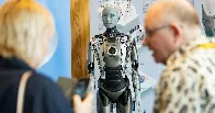 Robots say they won't steal jobs, rebel against humans