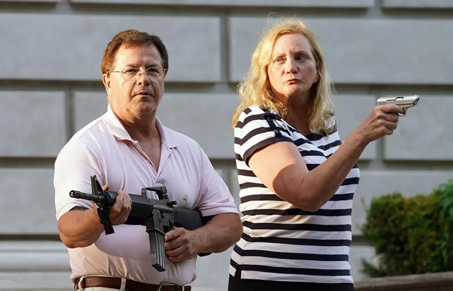 Mark and Patricia McCloskey touting guns