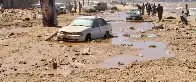 Libyan city buries thousands in mass graves after flood, while mayor says death toll could triple