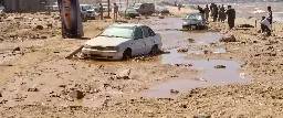 Libyan city buries thousands in mass graves after flood, while mayor says death toll could triple