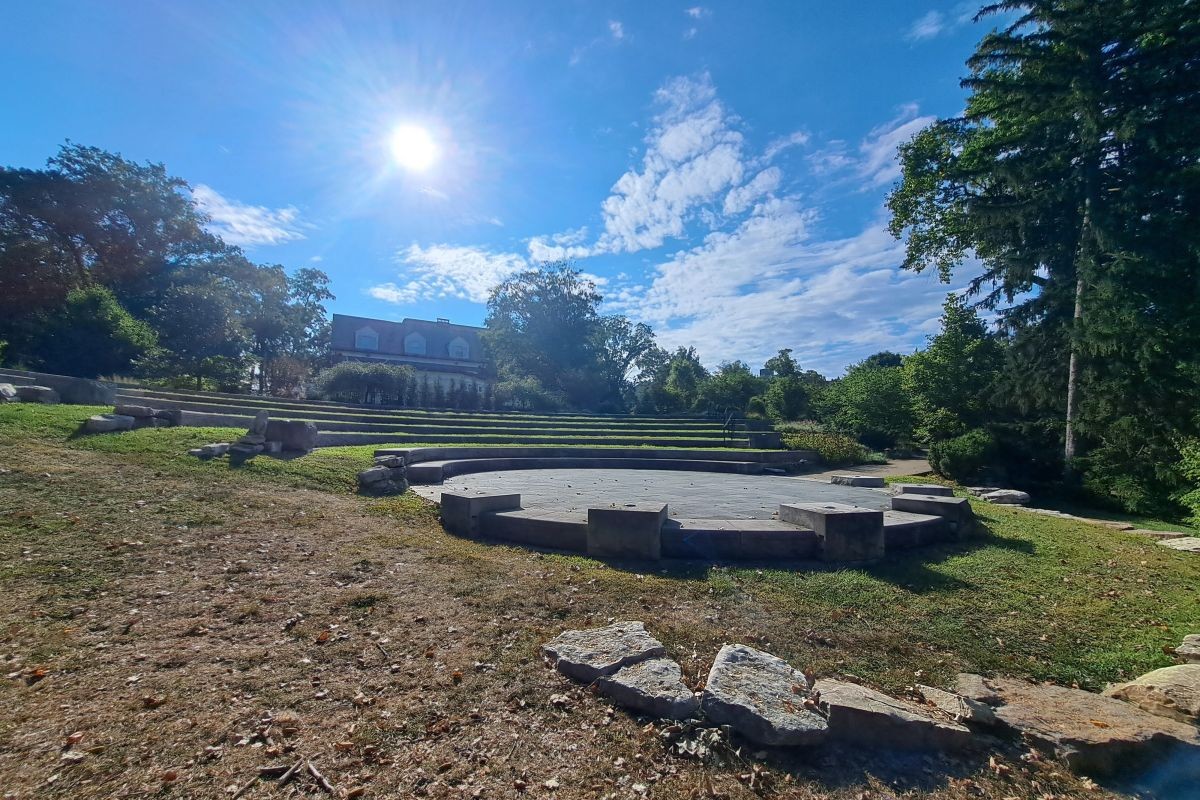 An outdoor amphitheatre with stone seating