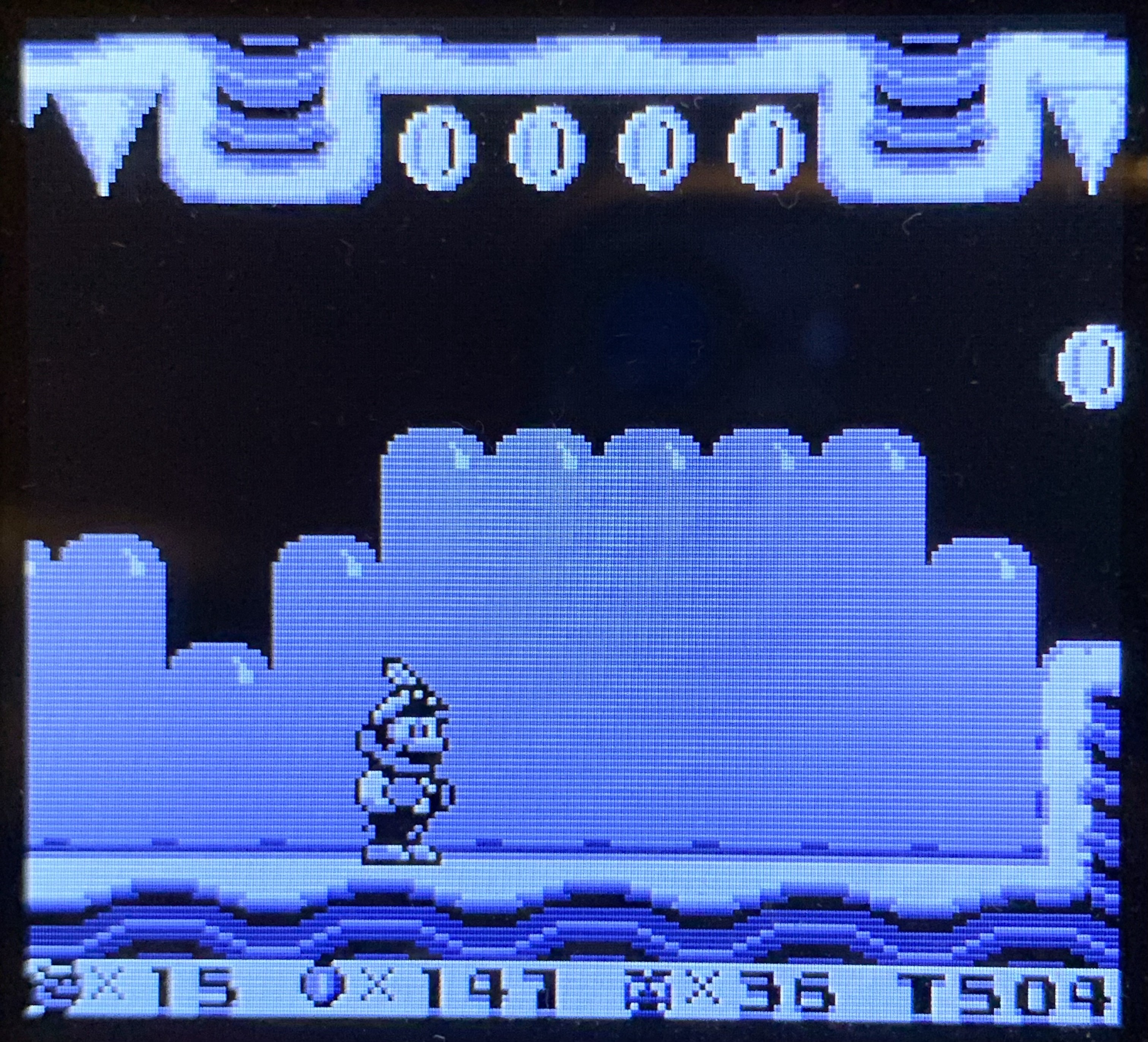 Mario is in a jelly level. Coins at the top. 