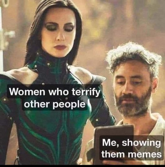 dark foreboding woman looking over Lil guy with a clipboard meme.  the woman is labeled Women who terrify other people. Lil guy labeled as Me showing them Memes