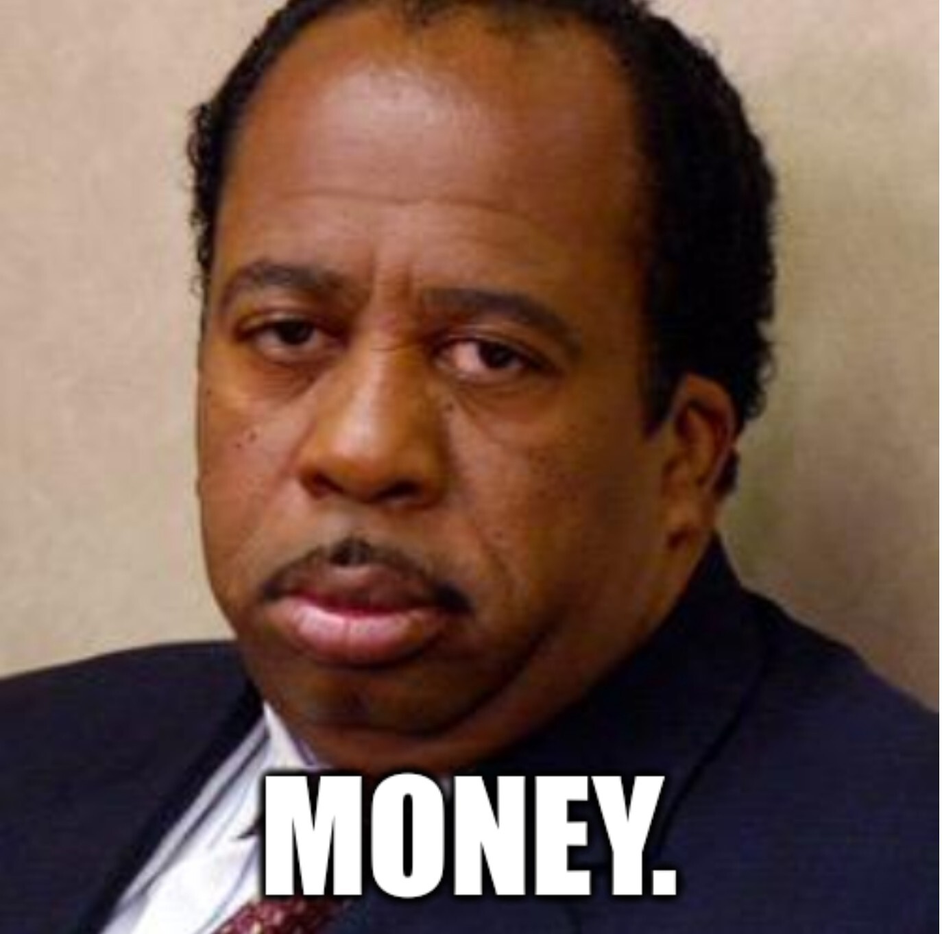 Stanley from the office with "Money" written under him.